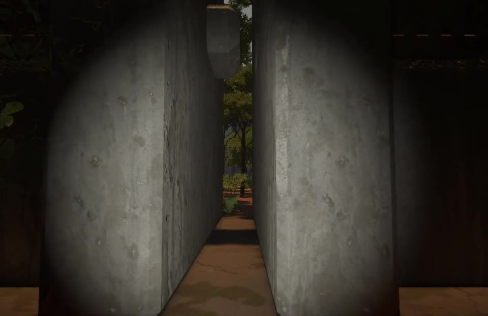 Two huge concrete doors closing, seen through a flashlight beam