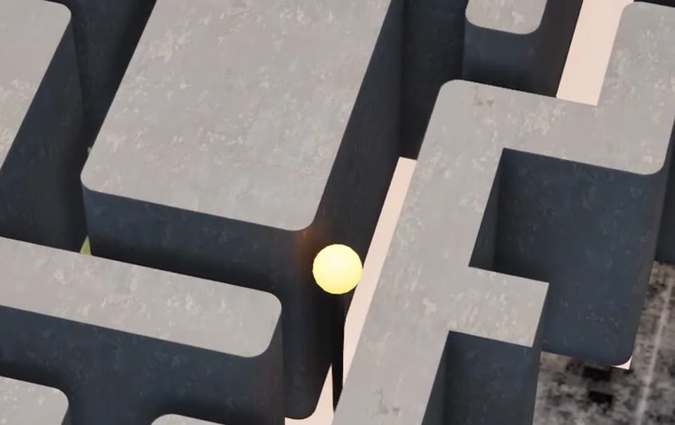 Close-up of the miniature maze with a glowing pin